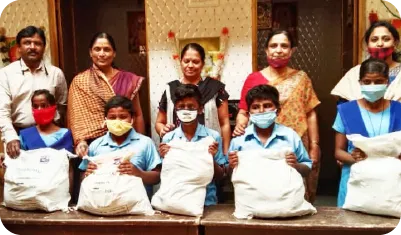  Group of children and women holding ration kits distributed through a community food relief program 